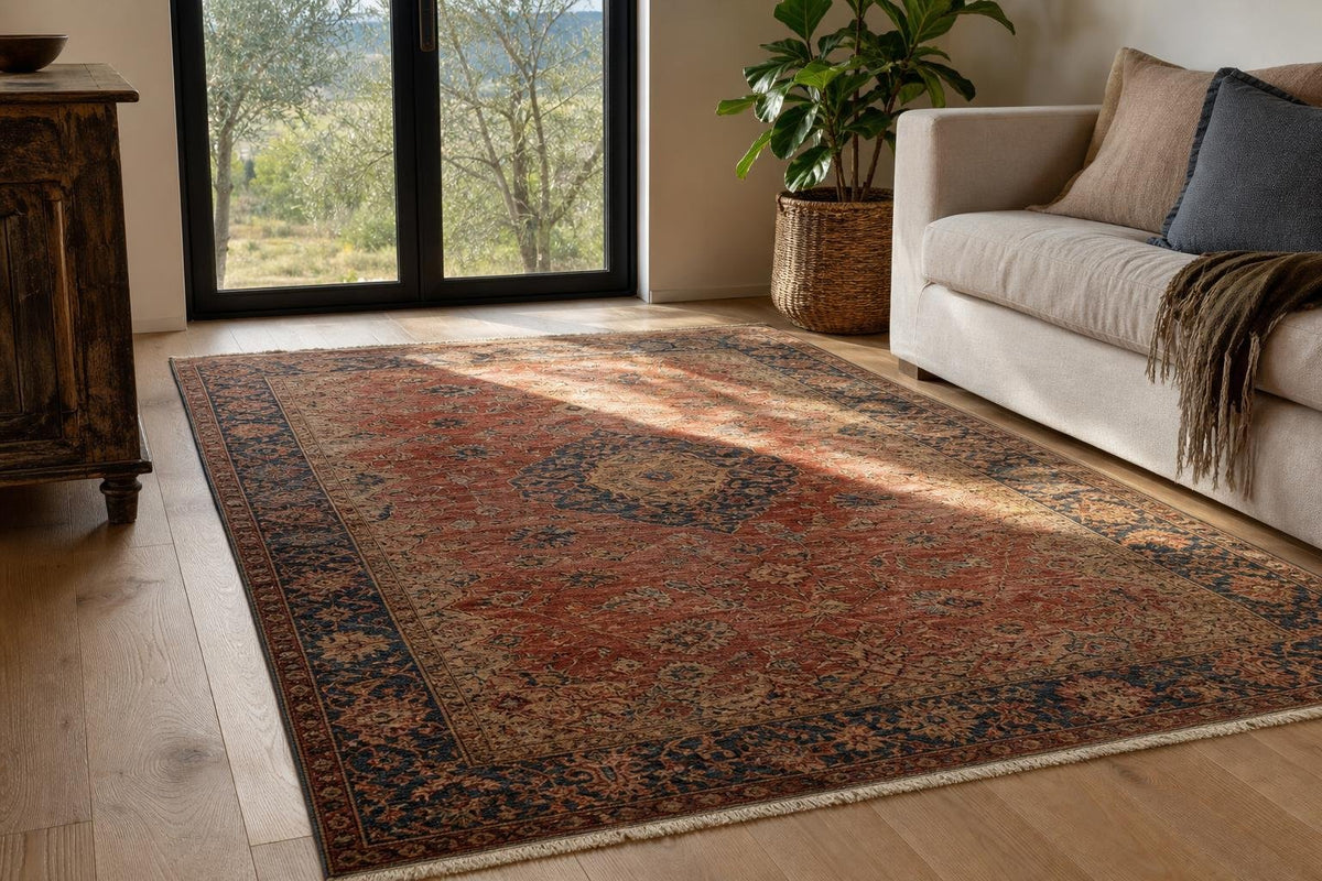 Restored vintage Persian rug in a bright living room