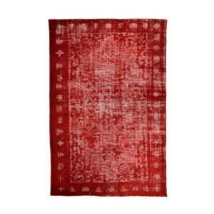 Vibrant red handknotted vintage Anatolian embossed rug from Turkey, measuring 315cm x 215cm, featuring intricate patterns and a rich texture, displayed in a stylish living space.