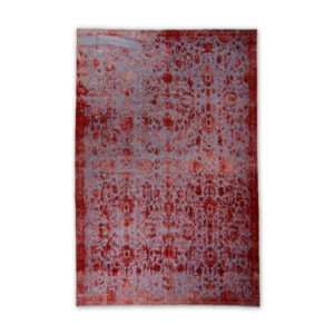 Handknotted vintage Persian rug with Kerman design, measuring 309cm x 223cm, featuring a bold blue background and vibrant red details, handmade in Iran.