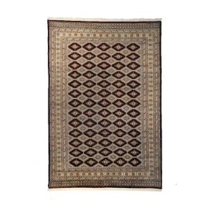 Patterned oriental rug with diamond motifs in black, beige, and brown tones.