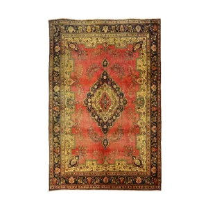 Oriental rug with red field, gold and black central medallion and ornate border patterns.
