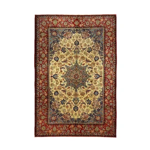 ornate Persian-style rug with a central medallion and beige field, surrounded by a red and blue floral border